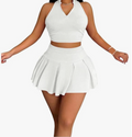 White halter crop top and pleated mini skirt co-ord set